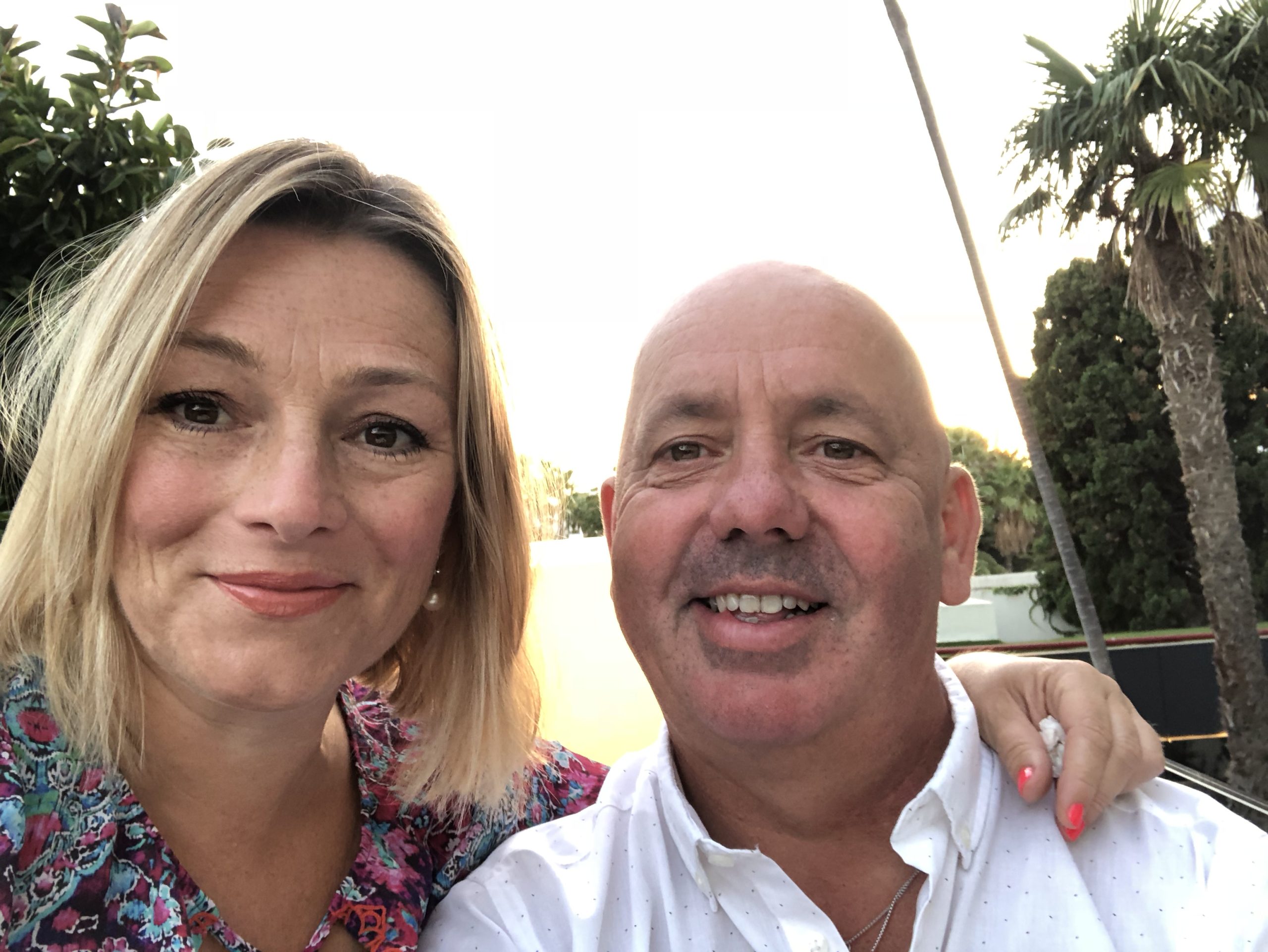 Mr & Mrs Prior smiling at the camera whilst on holiday