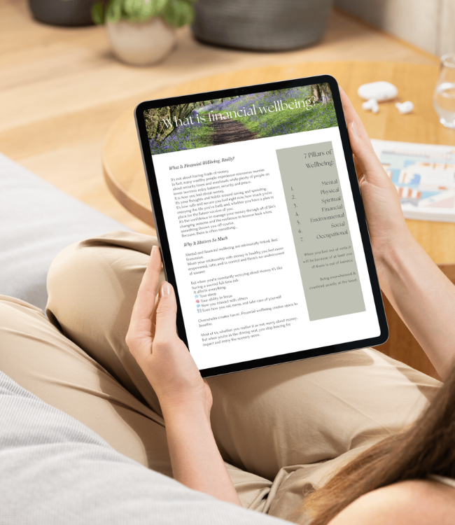 Financial Wellbeing Toolkit woman holding iPad with financial wellbeing e-guide