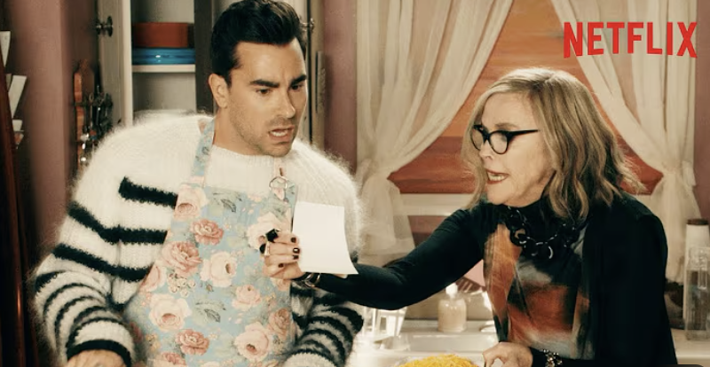 David and Moira fold it in scene